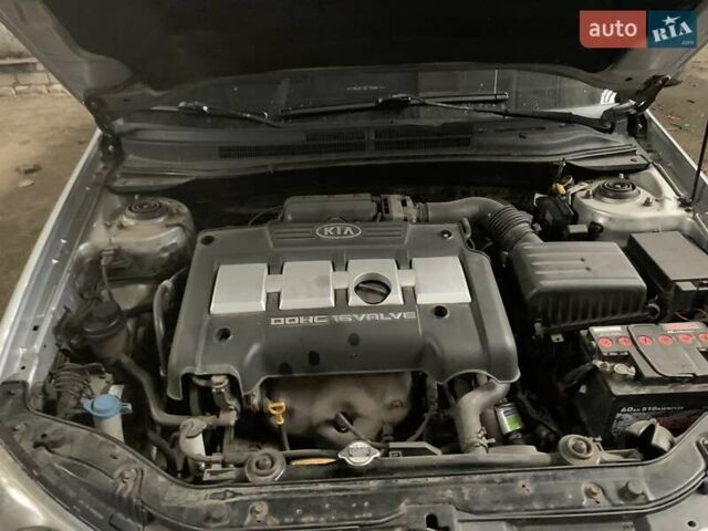 Серый Киа Черато, объемом двигателя 1.6 л и пробегом 200 тыс. км за 3700 $, фото 7 на Automoto.ua