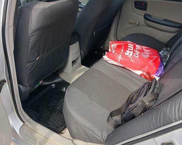 Серый Киа Черато, объемом двигателя 1.6 л и пробегом 192 тыс. км за 4200 $, фото 11 на Automoto.ua