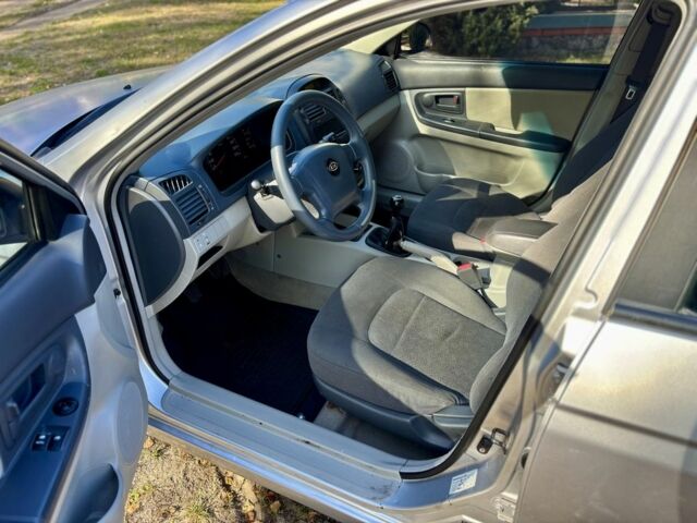 Серый Киа Черато, объемом двигателя 1.6 л и пробегом 221 тыс. км за 3500 $, фото 8 на Automoto.ua