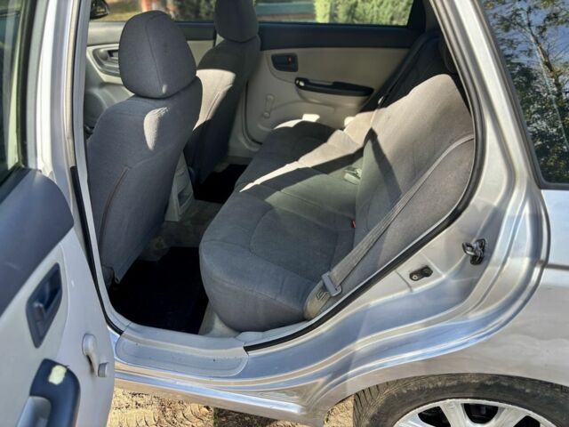 Серый Киа Черато, объемом двигателя 1.6 л и пробегом 221 тыс. км за 3500 $, фото 14 на Automoto.ua