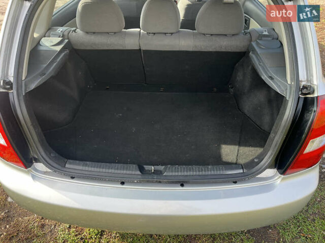 Серый Киа Черато, объемом двигателя 1.49 л и пробегом 257 тыс. км за 4400 $, фото 10 на Automoto.ua