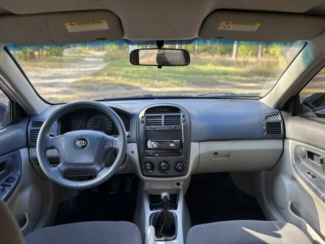 Серый Киа Черато, объемом двигателя 1.6 л и пробегом 221 тыс. км за 3500 $, фото 9 на Automoto.ua