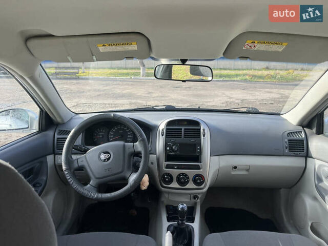 Серый Киа Черато, объемом двигателя 1.49 л и пробегом 257 тыс. км за 4400 $, фото 9 на Automoto.ua