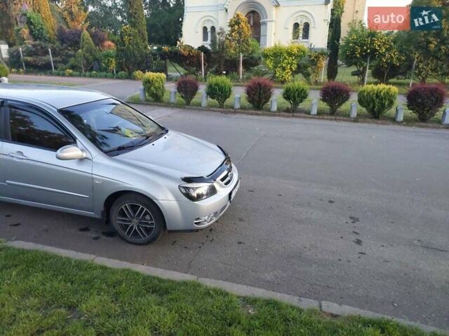 Серый Киа Черато, объемом двигателя 1.6 л и пробегом 190 тыс. км за 4000 $, фото 3 на Automoto.ua
