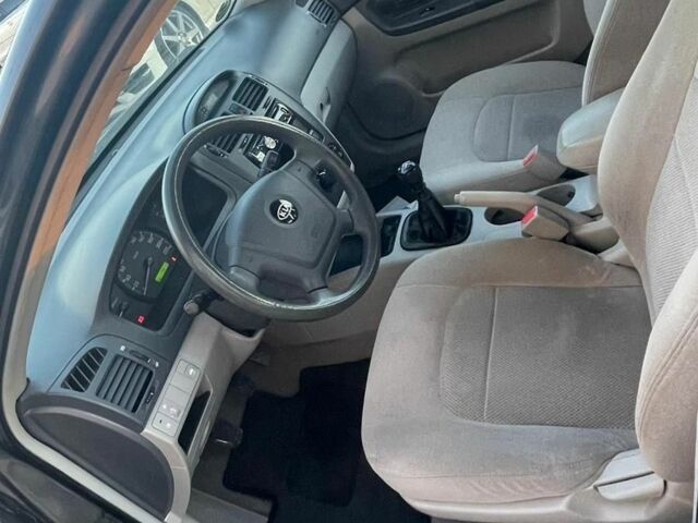 Сірий Кіа Черато, об'ємом двигуна 1.6 л та пробігом 233 тис. км за 2800 $, фото 3 на Automoto.ua