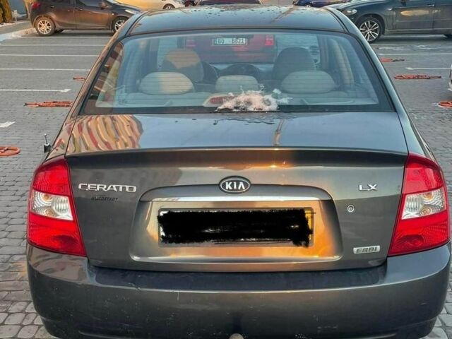 Сірий Кіа Черато, об'ємом двигуна 1.6 л та пробігом 233 тис. км за 2800 $, фото 7 на Automoto.ua