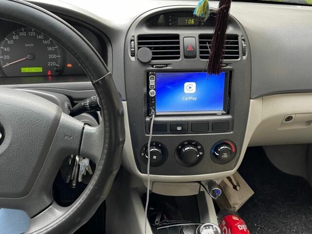 Сірий Кіа Черато, об'ємом двигуна 1.6 л та пробігом 233 тис. км за 2800 $, фото 12 на Automoto.ua