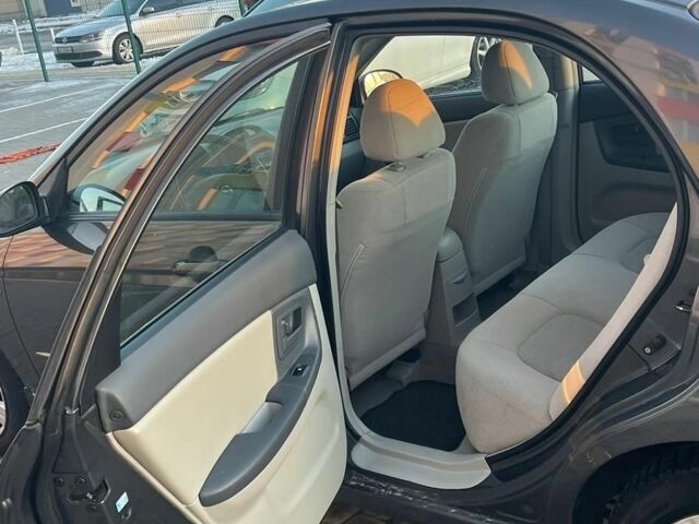 Сірий Кіа Черато, об'ємом двигуна 1.6 л та пробігом 233 тис. км за 2800 $, фото 5 на Automoto.ua