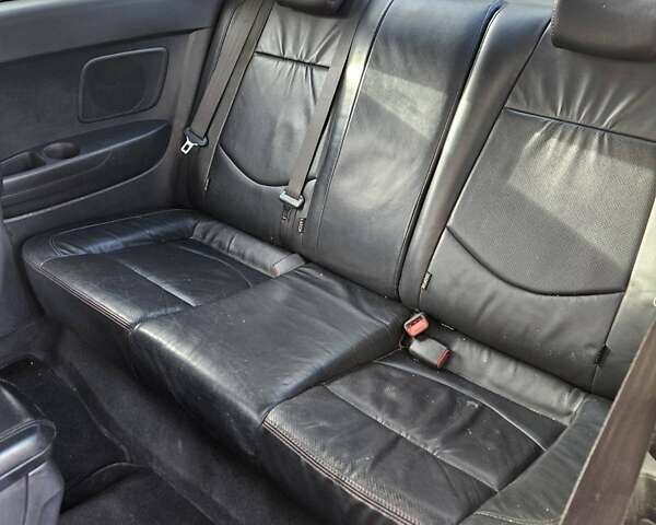 Сірий Кіа Черато, об'ємом двигуна 1.98 л та пробігом 332 тис. км за 6700 $, фото 9 на Automoto.ua