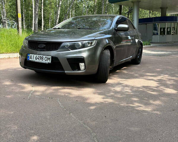 Серый Киа Черато, объемом двигателя 2 л и пробегом 212 тыс. км за 5999 $, фото 2 на Automoto.ua