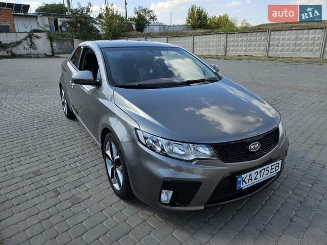 Серый Киа Черато, объемом двигателя 2 л и пробегом 100 тыс. км за 9000 $, фото 2 на Automoto.ua