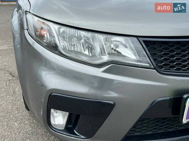 Серый Киа Черато, объемом двигателя 2 л и пробегом 186 тыс. км за 7399 $, фото 3 на Automoto.ua