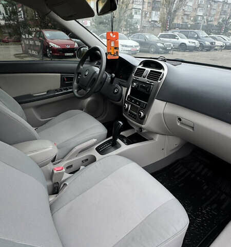 Серый Киа Черато, объемом двигателя 1.98 л и пробегом 166 тыс. км за 4099 $, фото 25 на Automoto.ua