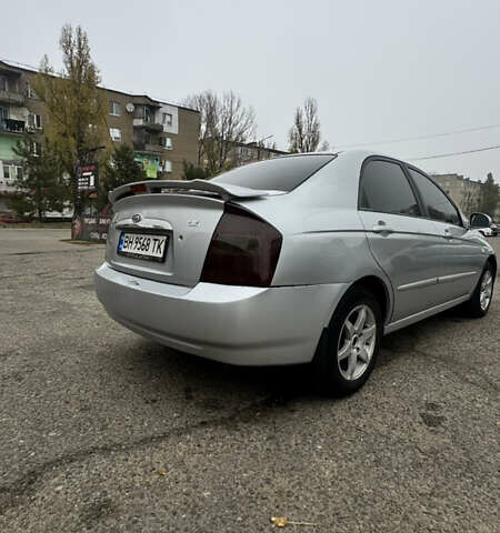 Серый Киа Черато, объемом двигателя 1.98 л и пробегом 166 тыс. км за 4099 $, фото 7 на Automoto.ua