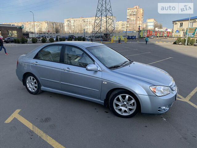 Сірий Кіа Черато, об'ємом двигуна 2 л та пробігом 300 тис. км за 4800 $, фото 2 на Automoto.ua