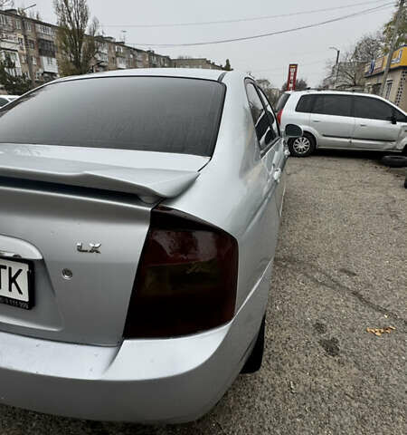 Серый Киа Черато, объемом двигателя 1.98 л и пробегом 166 тыс. км за 4099 $, фото 8 на Automoto.ua