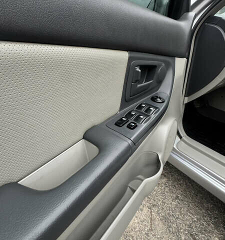 Серый Киа Черато, объемом двигателя 1.98 л и пробегом 166 тыс. км за 4099 $, фото 18 на Automoto.ua