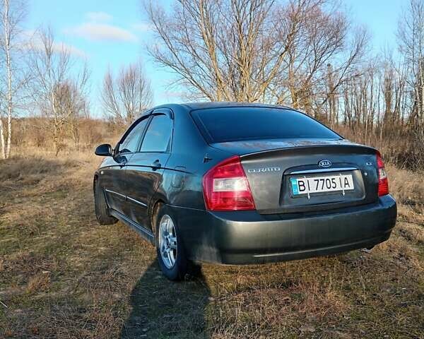 Серый Киа Черато, объемом двигателя 1.6 л и пробегом 192 тыс. км за 3500 $, фото 2 на Automoto.ua