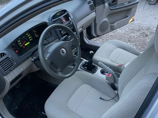 Серый Киа Черато, объемом двигателя 1.5 л и пробегом 204 тыс. км за 3700 $, фото 12 на Automoto.ua