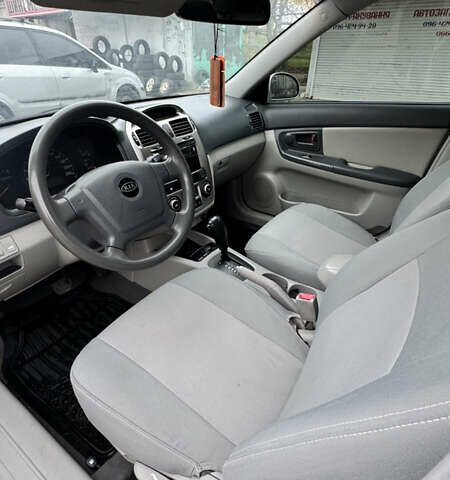 Серый Киа Черато, объемом двигателя 1.98 л и пробегом 166 тыс. км за 4099 $, фото 17 на Automoto.ua