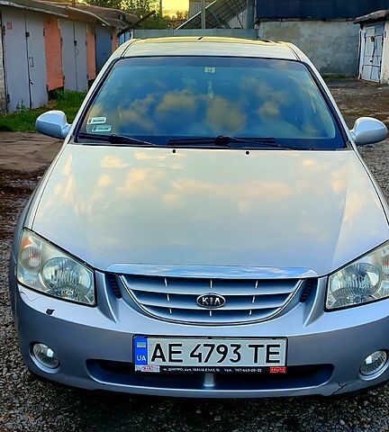 Серый Киа Черато, объемом двигателя 2 л и пробегом 220 тыс. км за 3950 $, фото 12 на Automoto.ua