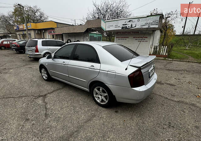 Серый Киа Черато, объемом двигателя 1.98 л и пробегом 166 тыс. км за 4099 $, фото 12 на Automoto.ua