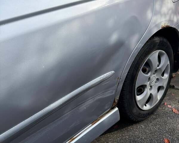 Серый Киа Черато, объемом двигателя 1.6 л и пробегом 178 тыс. км за 2900 $, фото 32 на Automoto.ua