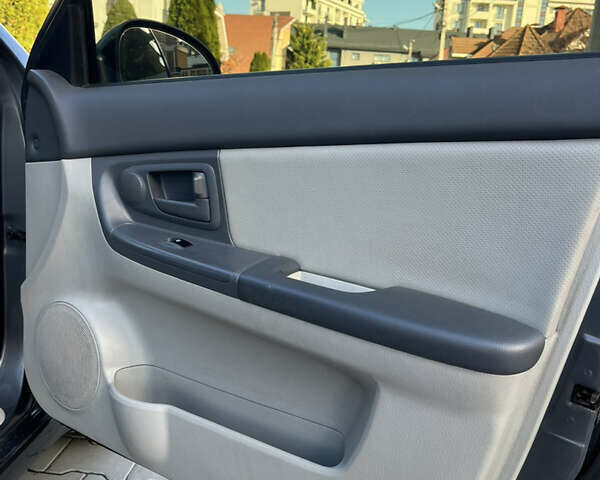 Серый Киа Черато, объемом двигателя 1.98 л и пробегом 275 тыс. км за 4300 $, фото 17 на Automoto.ua