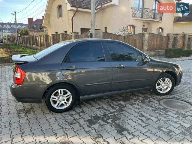 Серый Киа Черато, объемом двигателя 1.98 л и пробегом 275 тыс. км за 4300 $, фото 8 на Automoto.ua