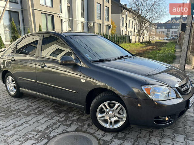 Серый Киа Черато, объемом двигателя 1.98 л и пробегом 275 тыс. км за 4300 $, фото 9 на Automoto.ua