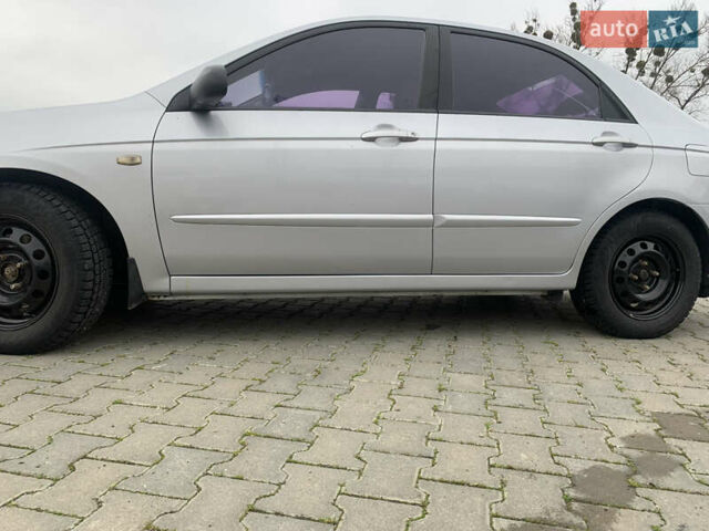 Серый Киа Черато, объемом двигателя 1.59 л и пробегом 240 тыс. км за 4500 $, фото 7 на Automoto.ua