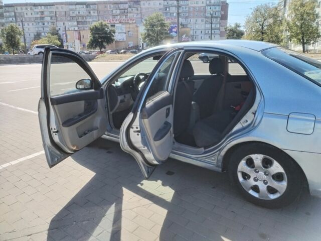 Серый Киа Черато, объемом двигателя 1.6 л и пробегом 315 тыс. км за 3650 $, фото 5 на Automoto.ua