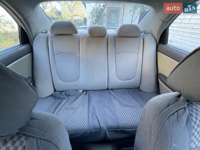 Серый Киа Черато, объемом двигателя 1.6 л и пробегом 178 тыс. км за 4500 $, фото 2 на Automoto.ua