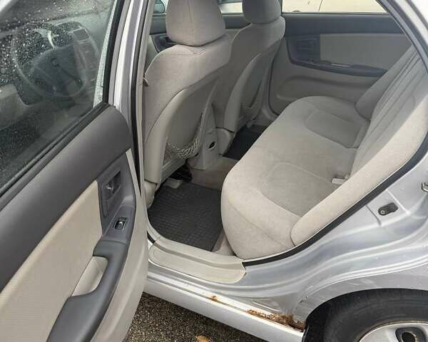 Серый Киа Черато, объемом двигателя 1.6 л и пробегом 178 тыс. км за 2900 $, фото 9 на Automoto.ua