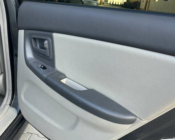 Серый Киа Черато, объемом двигателя 1.98 л и пробегом 275 тыс. км за 4300 $, фото 13 на Automoto.ua