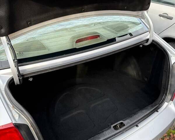 Серый Киа Черато, объемом двигателя 1.6 л и пробегом 178 тыс. км за 2900 $, фото 25 на Automoto.ua