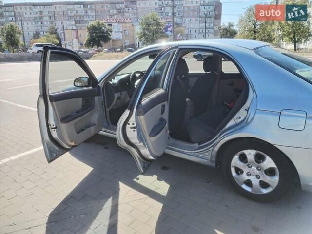 Сірий Кіа Черато, об'ємом двигуна 1.6 л та пробігом 297 тис. км за 3850 $, фото 4 на Automoto.ua