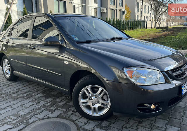 Серый Киа Черато, объемом двигателя 1.98 л и пробегом 275 тыс. км за 4300 $, фото 2 на Automoto.ua