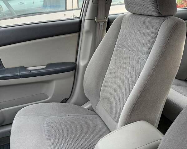 Серый Киа Черато, объемом двигателя 1.6 л и пробегом 178 тыс. км за 2900 $, фото 19 на Automoto.ua