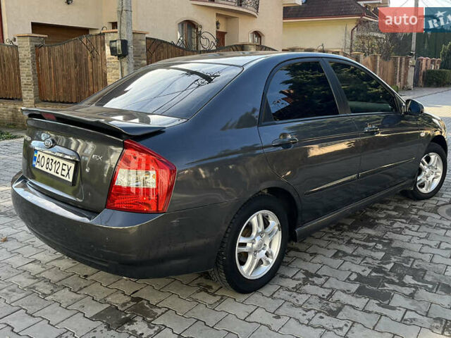 Серый Киа Черато, объемом двигателя 1.98 л и пробегом 275 тыс. км за 4300 $, фото 1 на Automoto.ua