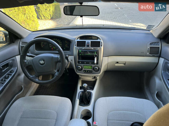 Серый Киа Черато, объемом двигателя 1.98 л и пробегом 275 тыс. км за 4300 $, фото 18 на Automoto.ua