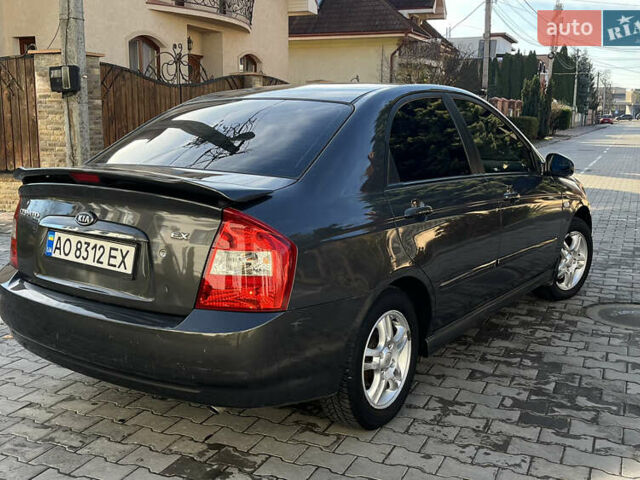 Серый Киа Черато, объемом двигателя 1.98 л и пробегом 275 тыс. км за 4300 $, фото 7 на Automoto.ua