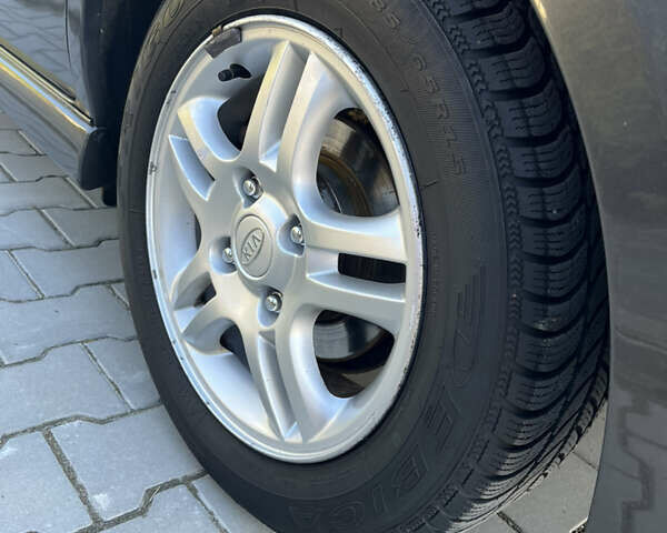 Серый Киа Черато, объемом двигателя 1.98 л и пробегом 275 тыс. км за 4300 $, фото 21 на Automoto.ua