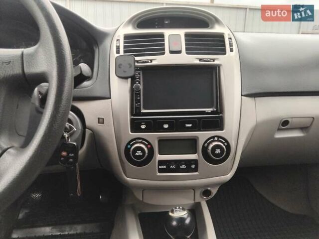 Серый Киа Черато, объемом двигателя 1.6 л и пробегом 380 тыс. км за 4100 $, фото 22 на Automoto.ua