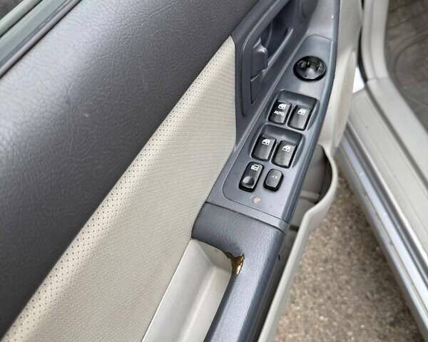 Серый Киа Черато, объемом двигателя 1.6 л и пробегом 178 тыс. км за 2900 $, фото 22 на Automoto.ua