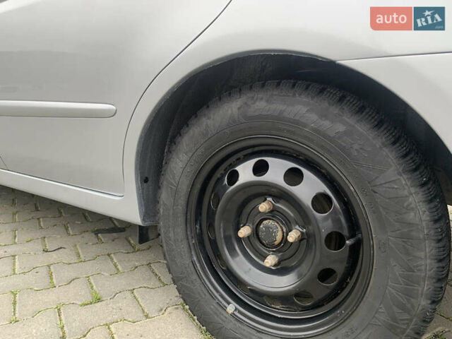 Серый Киа Черато, объемом двигателя 1.59 л и пробегом 240 тыс. км за 4500 $, фото 8 на Automoto.ua