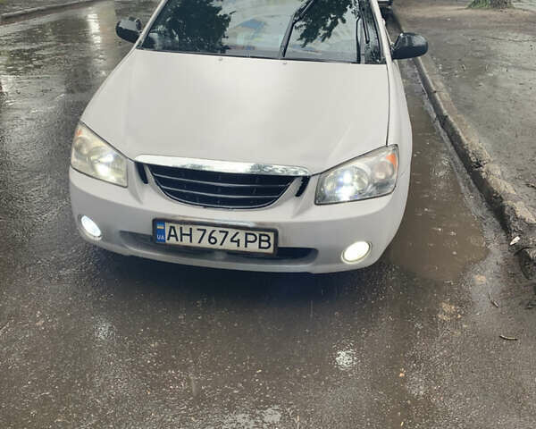 Серый Киа Черато, объемом двигателя 1.6 л и пробегом 303 тыс. км за 3500 $, фото 2 на Automoto.ua