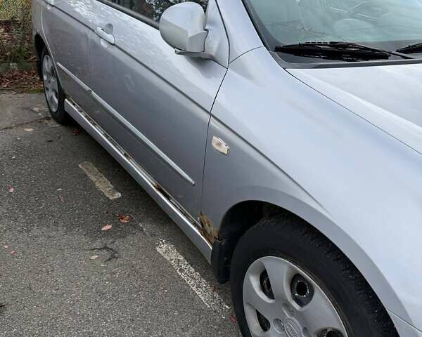 Серый Киа Черато, объемом двигателя 1.6 л и пробегом 178 тыс. км за 2900 $, фото 4 на Automoto.ua