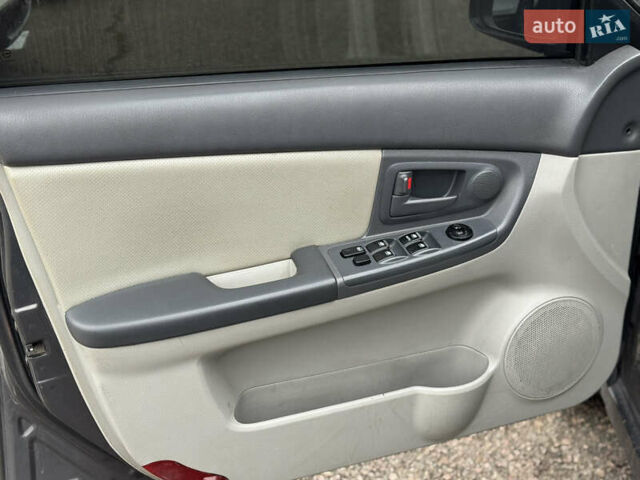 Сірий Кіа Черато, об'ємом двигуна 1.6 л та пробігом 290 тис. км за 3800 $, фото 8 на Automoto.ua