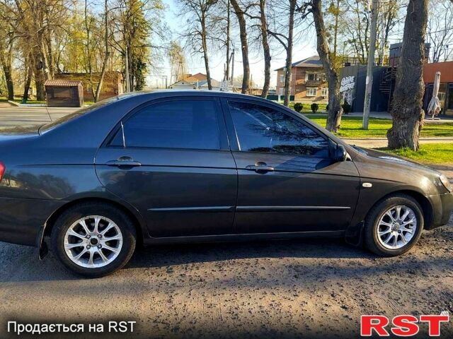 Серый Киа Черато, объемом двигателя 1.6 л и пробегом 255 тыс. км за 4000 $, фото 1 на Automoto.ua